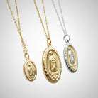 Three gold necklaces with 'Our Lady' pendants on a white background