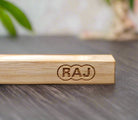 Natural bamboo incense holder with minimalist design and wood grain texture