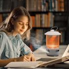 Vintage-style USB humidifier shaped like a kerosene lamp, glowing with soft light