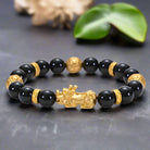 Unisex black agate bracelet with natural stone beads and Zodiac-inspired design for grounding, balance, and stylish everyday wear.