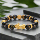 Unisex black agate bracelet with natural stone beads and Zodiac-inspired design for grounding, balance, and stylish everyday wear.