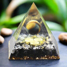 Crystal Ball Pyramid resin sphere with crushed stones for energy healing and spiritual décor