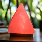 Pyramid-shaped Himalayan Salt Lamp with wooden base and multicolor LED glow