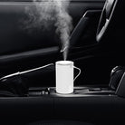 Portable car air purifier with anion technology and one-touch colored light for fresh, clean air and odor removal in vehicles.